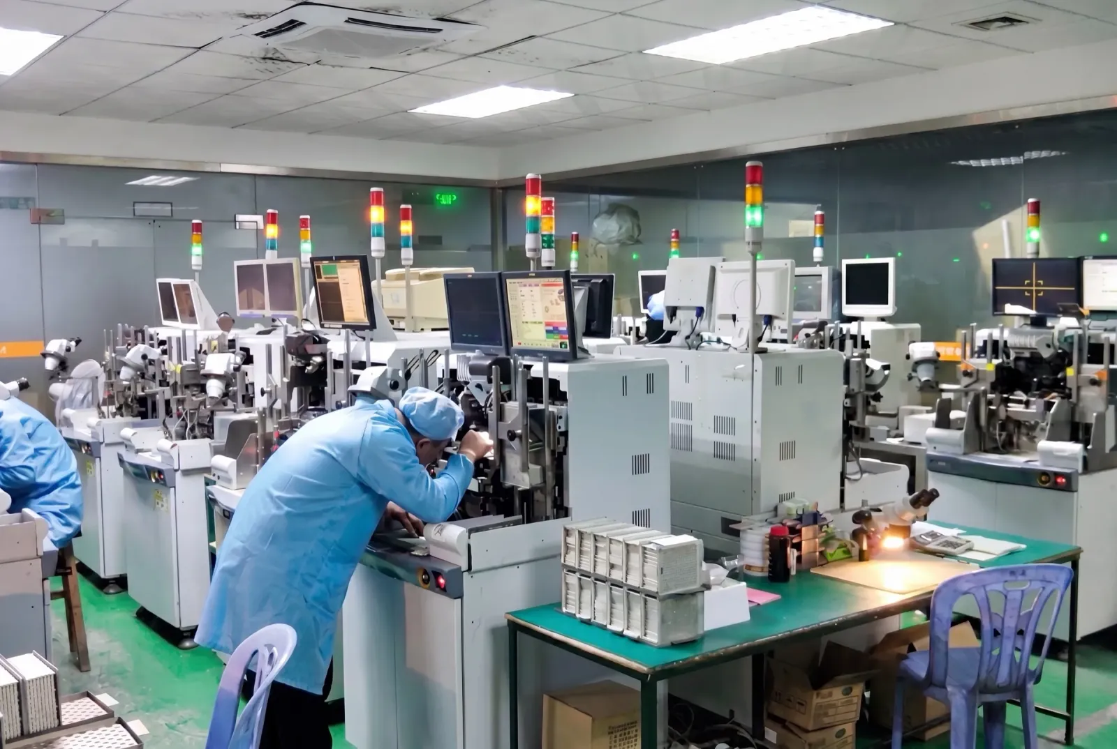 SMT pick-and-place lines staffed by operators in the strip factory, the production step a genuine supplier names without checking first